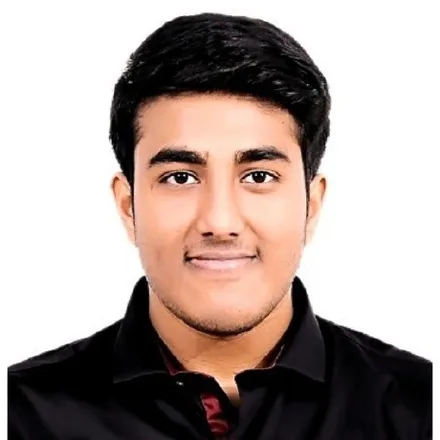 Head and shoulders photograph of Anurag Bheemappa Gnanamurthy, facing the camera in a dark collared shirt against a plain light background